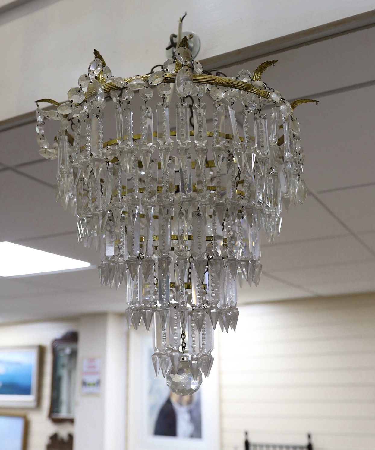 A large five tier graduated glass lustre chandelier